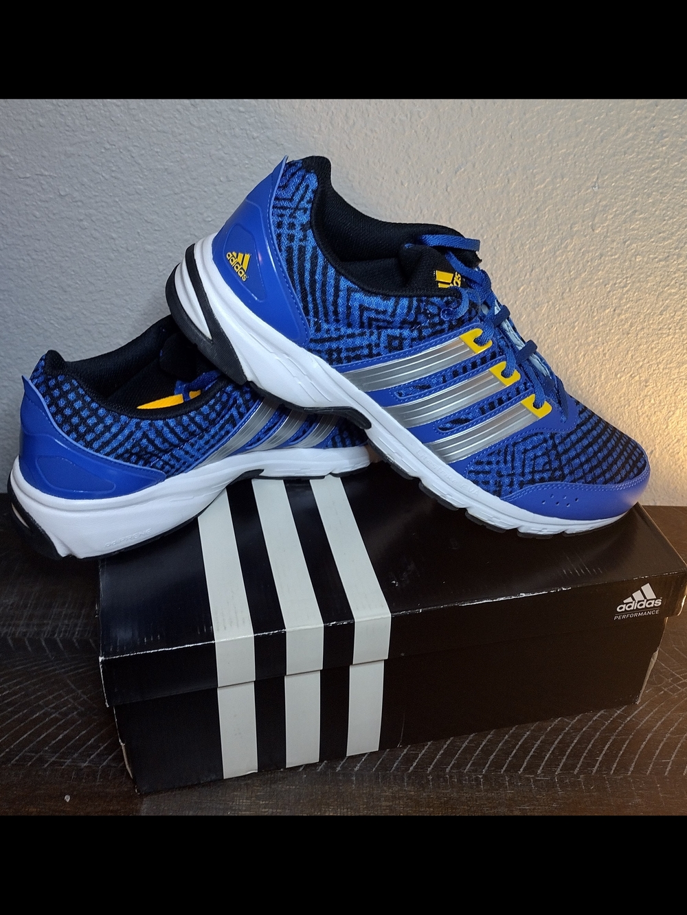 Adidas Men's Blue Running Shoes with Silver Stripes